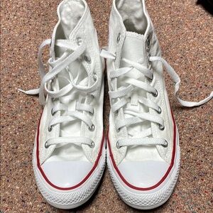 Converse High-Top White with Red stripe sneakers.
